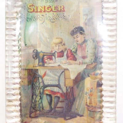 Sale Photo Thumbnail #198: Singer Sewing Machine paperweight