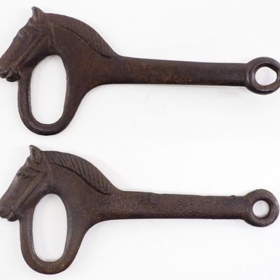 Sale Photo Thumbnail #484: Pair of cast iron horse head barn door latches