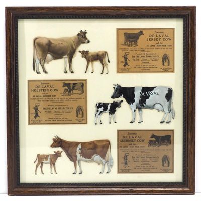 Sale Photo Thumbnail #77: 1930's set of DeLaval tin cow & calf sets