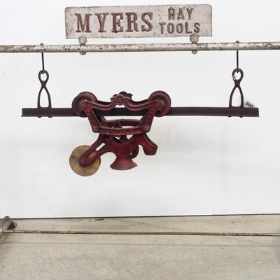 Sale Photo Thumbnail #736: Myers Hay Tools store display with hay car