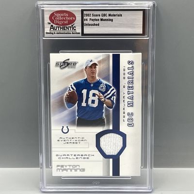 Sale Photo Thumbnail #136: 2002 Score QBC Materials Peyton Manning Event Worn Relic Slabbed By Sports Collectors Digest