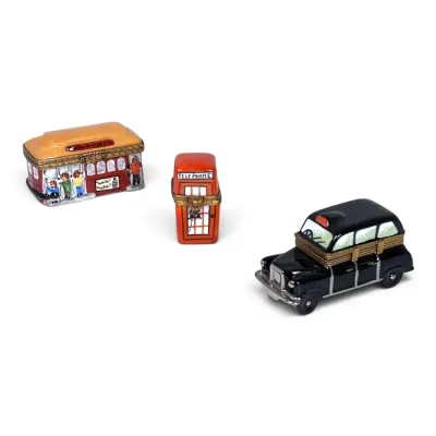 Sale Photo Thumbnail #133: Three vintage porcelain Limoges-style hinged trinket boxes, featuring a San Francisco cable car, a red British telephone booth, and a black London taxi cab.