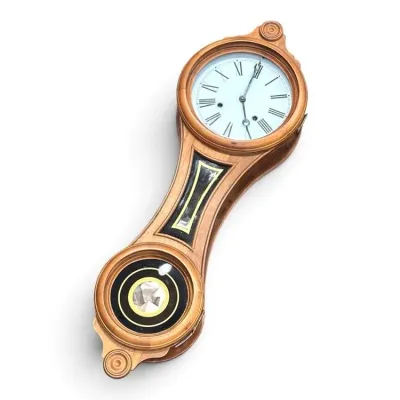 Sale Photo Thumbnail #184: Antique banjo wall clock featuring a light wood case, Roman numeral dial, and reverse-painted glass panels with gold accents.