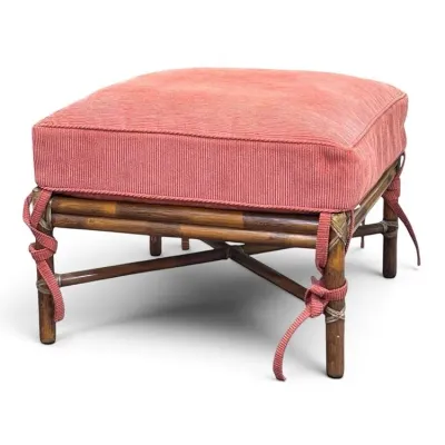 Sale Photo Thumbnail #94: Vintage bamboo and rattan ottoman featuring a removable coral pink corduroy cushion with tie-down straps.