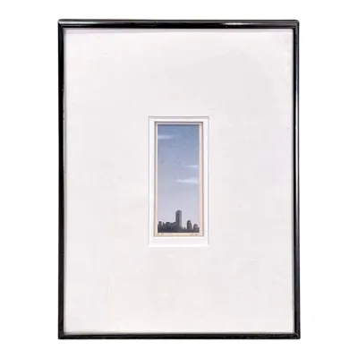 Sale Photo Thumbnail #70: Framed miniature print depicting a city skyline under a blue sky, presented in a wide white mat and a simple black frame.