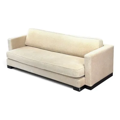 Sale Photo Thumbnail #97: Mid-century modern style sofa upholstered in a textured cream fabric, featuring a single long seat cushion, a tight back, and dark block feet.