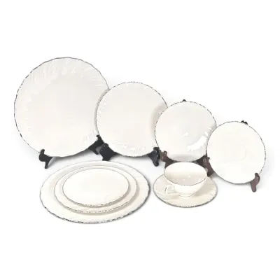 Sale Photo Thumbnail #190: Lenox 'Eternal' pattern fine china dinnerware set, featuring a classic cream body with a gold-trimmed rim and subtle swirl texture.