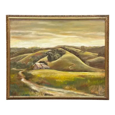 Sale Photo Thumbnail #74: Vintage oil landscape painting depicting a rustic barn nestled in rolling green hills, signed by artist Luci Johnston and housed in an ornate gold-finished frame.