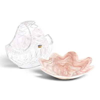 Sale Photo Thumbnail #194: Polish 24% lead crystal basket with a diamond-cut pattern, paired with a pink and white marbled glass ruffle bowl.