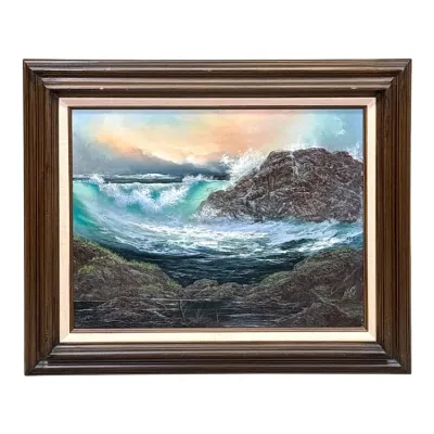 Sale Photo Thumbnail #76: Mid-century seascape oil painting depicting crashing waves against a rocky shoreline, housed in a dark wood frame with a linen liner.
