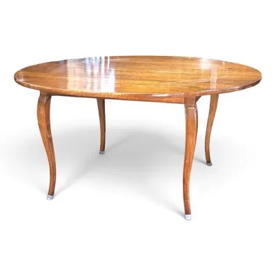 Sale Photo Thumbnail #108: French Provincial style oval dining table in a warm honey oak finish, featuring elegant cabriole legs.