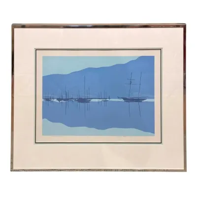 Sale Photo Thumbnail #31: Framed and matted serigraph print depicting sailboats on calm blue water, signed and numbered by the artist.