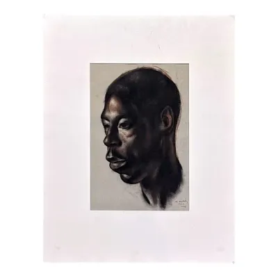 Sale Photo Thumbnail #50: Original charcoal and pastel portrait of a man in profile, signed and dated 1942, presented in a white mat.