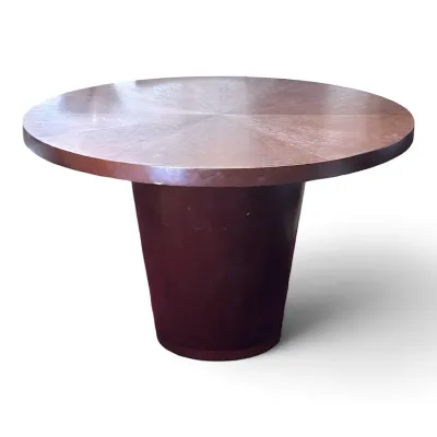 Sale Photo Thumbnail #89: Mid-century modern style round wooden dining table featuring a sunburst veneer top and a thick pedestal base.