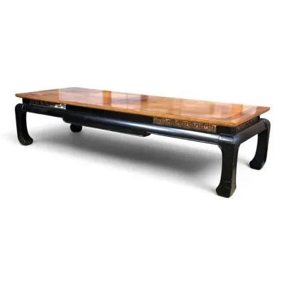 Sale Photo Thumbnail #111: Asian-style low coffee table featuring a light wood parquetry top, black lacquered base with chow legs, and decorative fretwork details.
