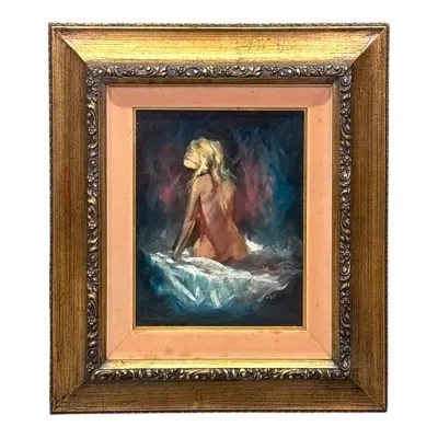 Sale Photo Thumbnail #81: Original oil painting depicting a seated female nude from behind, housed in an ornate gilt wood frame with a pink velvet liner.