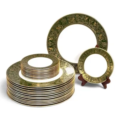 Sale Photo Thumbnail #180: Wedgwood 'Florentine Green' bone china dinnerware set, featuring stacks of dinner plates and bread plates with intricate gold and green mythical creature borders.
