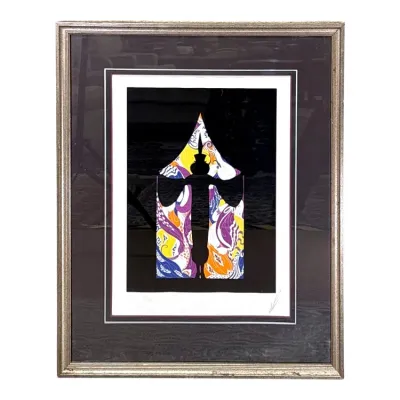 Sale Photo Thumbnail #54: Erté limited edition serigraph titled 'Wings', featuring a stylized, colorful silhouette on a black background, double-matted and housed in a silver-gilt frame.
