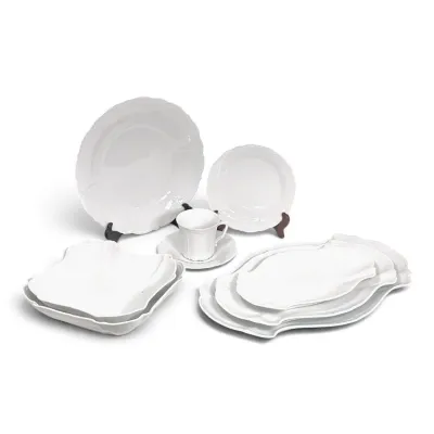 Sale Photo Thumbnail #200: Richard Ginori white porcelain dinnerware set in the Italian Fruit shape, featuring elegant scalloped edges and embossed details.