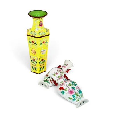 Sale Photo Thumbnail #196: Chinese cloisonné enamel yellow ground vase alongside a pair of Famille Rose porcelain wall pocket vases decorated with floral motifs.