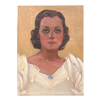 Sale Photo Thumbnail #37: Vintage oil portrait of a woman with dark hair and a white dress, set against a textured gold background, circa 1930s to 1940s.