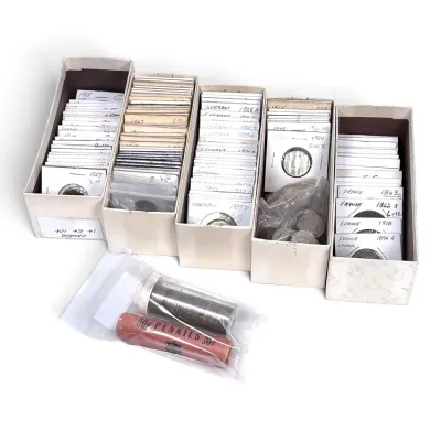 Sale Photo Thumbnail #140: Collection of international and domestic coins, organized in cardboard storage boxes with individual 2x2 cardboard holders, loose coins, and a roll of pennies.