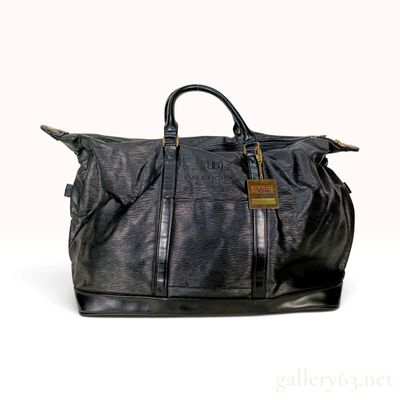 Sale Photo Thumbnail #316: Vintage Balenciaga Golf Club Black Linear Textured Synthetic and Leather Duffle Bag