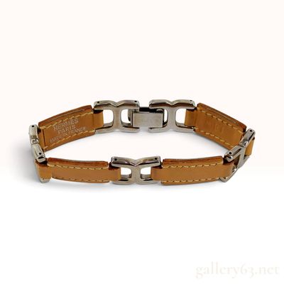 Sale Photo Thumbnail #256: Vintage Hermes Dandy Tan Leather and Silver Tone Link Bracelet