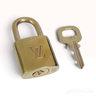 Sale Photo Thumbnail #299: Louis Vuitton Brass Padlock and Matching Key 313