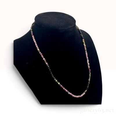 Sale Photo Thumbnail #358: A Multi-Color Faceted Tourmaline Bead and 18 Karat Yellow Gold Necklace