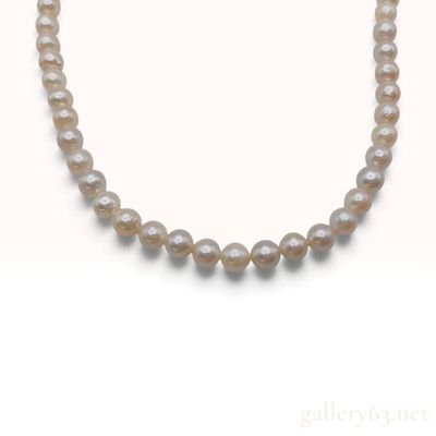 Sale Photo Thumbnail #438: A Cultured Pearl and Sterling Silver Floral Box Clasp Strand Necklace