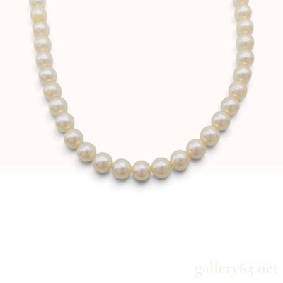Sale Photo Thumbnail #64: A Cultured Pearl Hand Knotted Necklace with Silver Clasp
