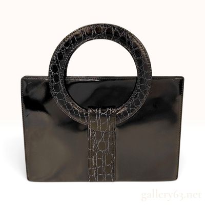 Sale Photo Thumbnail #265: Vintage Yves Saint Laurent Black Patent Leather Circular Handle Handbag