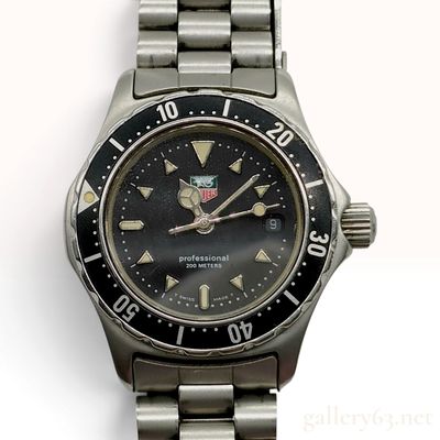 Sale Photo Thumbnail #391: Vintage TAG Heuer Professional 200 Meters Black Stainless Steel Lady Divers Watch WE1410-2