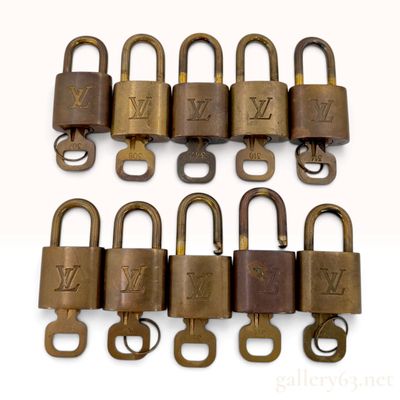 Sale Photo Thumbnail #534: Ten Vintage Louis Vuitton Brass Padlocks and Keys