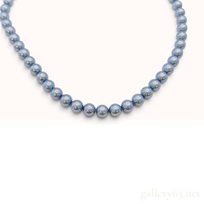 Sale Photo Thumbnail #154: A Blue Dyed Cultured Pearl Single Strand Necklace with Silver Floral Clasp