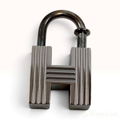 Sale Photo Thumbnail #389: Vintage Hermes H 2000 Silver Tone Cadena Lock Charm