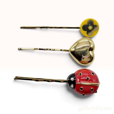 Sale Photo Thumbnail #194: Louis Vuitton Ladybug and Heart Three Piece Gold Tone Hair Pin Set