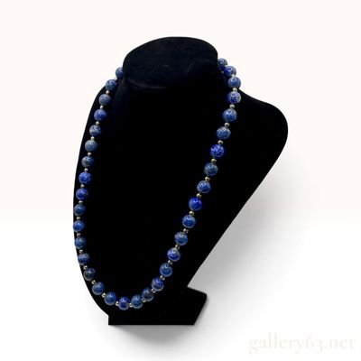 Sale Photo Thumbnail #507: A Lapis Lazuli and Gold Toned Sterling Silver Bead Necklace