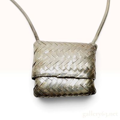 Sale Photo Thumbnail #7: Vintage Tiffany & Co. Pill Case Necklace in Woven Sterling Silver