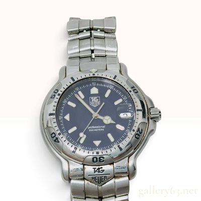 Sale Photo Thumbnail #431: Vintage TAG Heuer 6000 Series Professional 200 Meters Blue Dial Stainless Steel Wristwatch