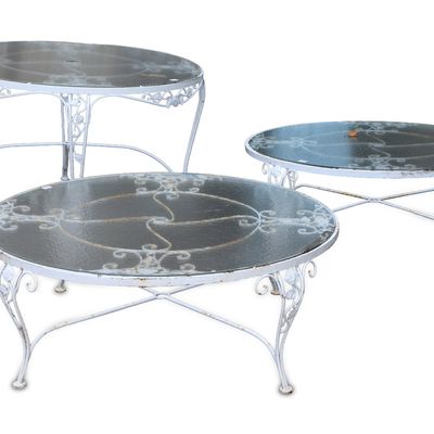 Three Round White Painted Cast-Aluminum Outdoor Tables