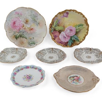 Two Floral Decorated Porcelain Chargers