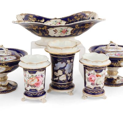 Eight Cobalt and Gilt Porcelain Table Articles