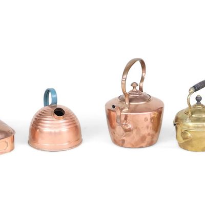 Seven Copper and Brass Kettles
