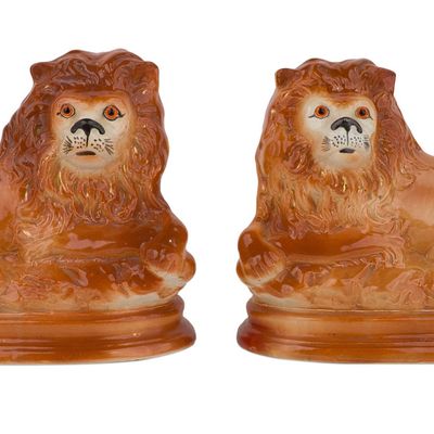 Pair of Staffordshire Reclining Lions