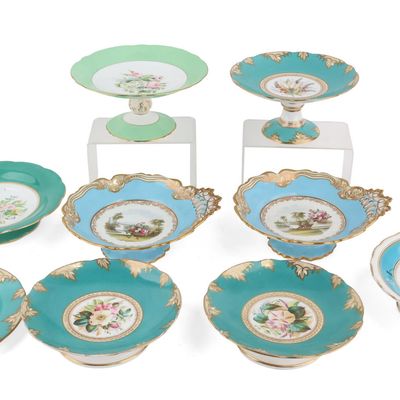 Nine Floral-Decorated Porcelain Compotes and Plates