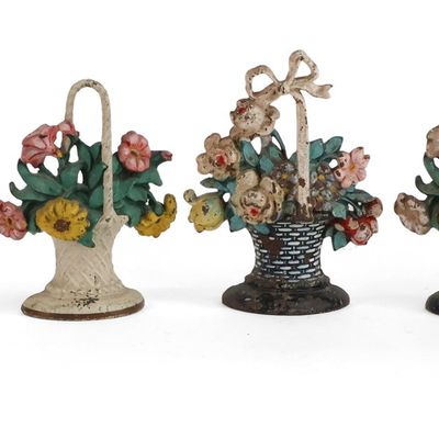 Six Painted Cast-Iron Flower Basket Doorstops