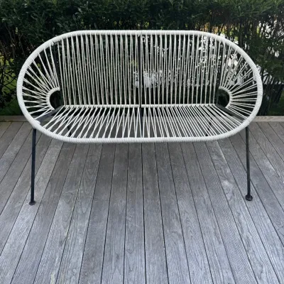Sale Photo Thumbnail #9: Mid-century modern style Acapulco-style outdoor loveseat bench featuring white woven cord on a black metal frame.