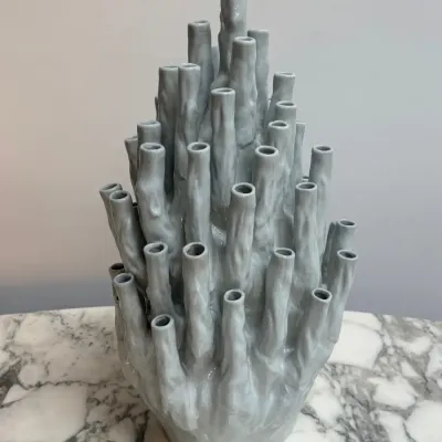 Sale Photo Thumbnail #133: Contemporary ceramic multi-stem tulipiere vase with a glossy light gray glaze, featuring a textured, organic coral-like structure.